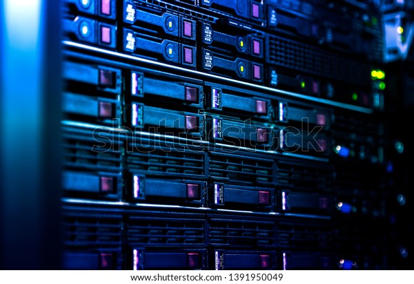 Close up server rack cluster in a data center\
selected focus, narrow depth\
field