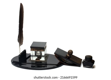 Close Up Of Several Bakelite Office Items With Pen Ink Inkwell Pen Holder And Rocker On White Background As Concept For Elegant Vintage Desk Set