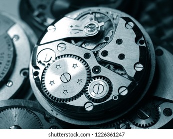 close up of several vintage mechanical watch caliber gears - Shutterstock ID 1226361247
