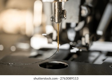 Close Up of Sewing Machine Needle Threading Industrial Details
