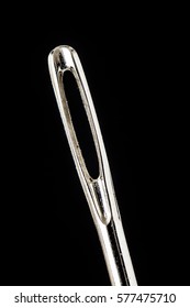 Close up of sewing needle eye