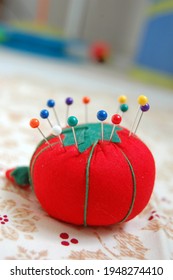 Close Up Of A Sewing Pin Cushion With Pins