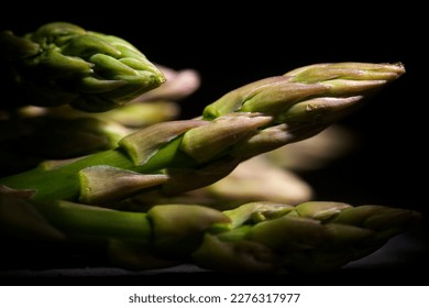 Close up in the shade of a bunch of wild asparagus. - Powered by Shutterstock