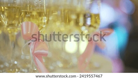 close up of shampagne flutes at wedding reception