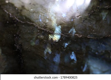 A Close Up Of A Shiny Surface On A Labradorite Rock.