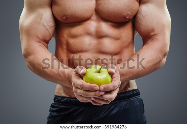 Close Shirtless Bodybuilder Holding Apple His Stock Photo ...