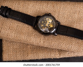 Close up shoot of black skeleton automatic watch. Captured on a dark mood style