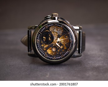 Close up shoot of black skeleton automatic watch. Captured on a dark mood style