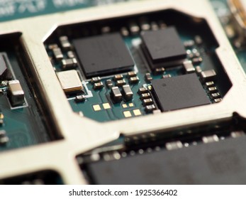 Close up shoot of Surface Mount Device (SMD) parts micro chips processors on  a Printed Circuit Board (PCB)