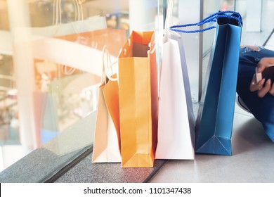 Close Up Of Shopping Bags On Floor In Department Store, Lifestyle And Shopping Concept