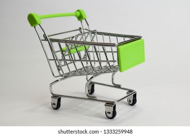 Close up shopping cart, shopping trolley isolated on white background - Powered by Shutterstock