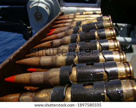 Close up shot of 7.62mm ammunition with red tracer tips