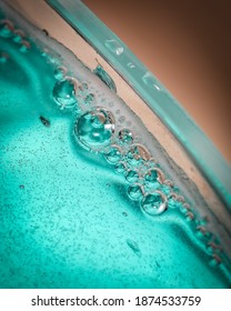 Close Up Shot Of Air Bubbles In Mouth Wash Liquid.