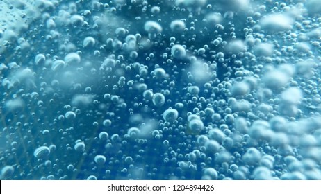 Close Up Shot Of Air Bubbles Taken Underwater Symbolising The Essence Of Life And The Universe 