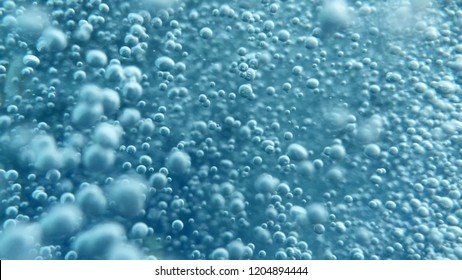 Close Up Shot Of Air Bubbles Taken Underwater Symbolising The Essence Of Life And The Universe.  