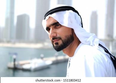 Close Up Shot Of Arab Business Man Not Looking On The Camera Wearing Traditional Kandura And Ghutra Middle Eastern Menswear