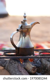 Close Up Shot Of Arabic Coffee Pot Above The Fire Camp In Desert In Riyadh, Saudi Arabia