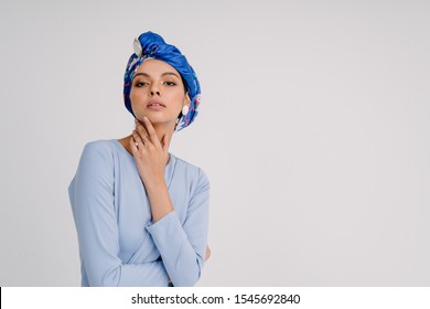 Close Up Shot Of Arabic Woman Wearing Modern Turban.Beauty And Fashion.