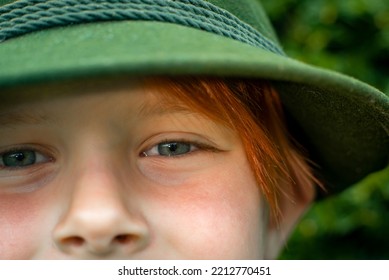 Close Shot Of A Boy Of Eight Years Old With Red Hair, Childhood Concept