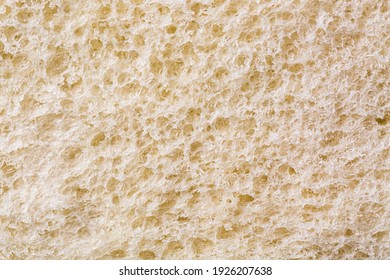 Close Up Shot Of A Bread Background Texture. Macro Bread Slice Texture Pattern.