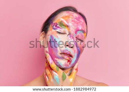 Similar – Image, Stock Photo Woman with painted face