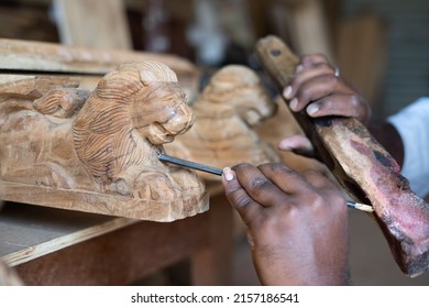 Close Up Shot Of Carpenter Hands Busy Making Wood Design Or Shaping Using Carpentry Tools At Shop - Concept Of Creativity, Skilled Labour And Wood Worker