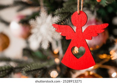 Close up shot of Christmas tree decoration angel toy. Merry Christmas and Happy New Year. Winter magic and happiness of celebration winter holiday. Fir tree ornaments - Powered by Shutterstock