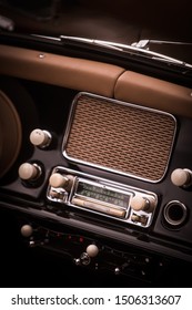 Close Up Shot Of A Classic Vintage Car Stereo On The Dashboard.