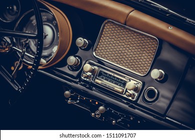 Close Up Shot Of A Classic Vintage Car Stereo On The Dashboard.