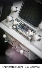 Close Up Shot Of A Classic Vintage Car Stereo On The Dashboard.