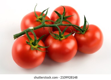 Close Up Shot Of Cluster Tomatoes On A White Background