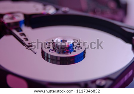 Close up shot, Colorful disassembled hard drive that part of Computer, PC, Notebook on Diaster HDD Concept