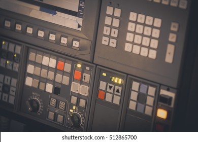 Close up shot of a control panel with many buttons.