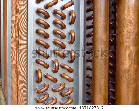 Close shot of copper plain tubes of a condenser coil. Stok fotoğraf © 