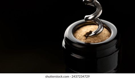 Close up shot of a corkscrew in the process of uncorking a bottle of wine, capturing the anticipation and celebration as the cork is about to be released.