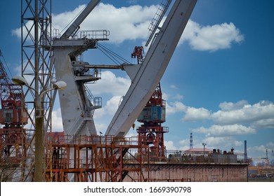 Close up shot of a crane at a harbour.