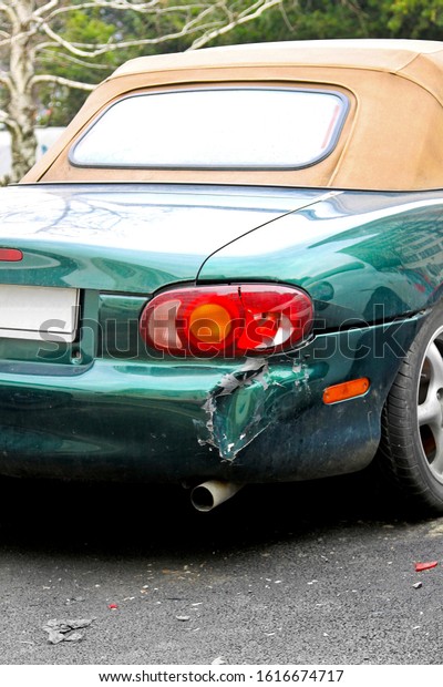 Close up shot of crashed
car bumper 
