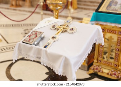 Close up shot of a cross in Orthodox church. Christ cross in church. Wedding concept