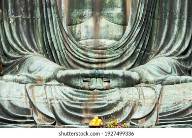Close up shot of the Daibutsu (Giant Buddha) statue in Kamakura, Japan