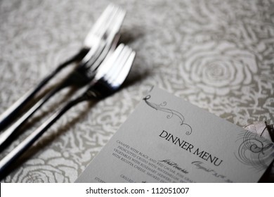 Close Up Shot Of A Dinner Menu On A Table