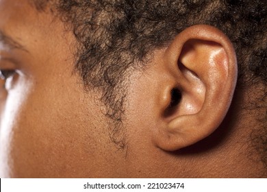 Close Up Shot Of The Ear Of A Dark-skinned Young Man