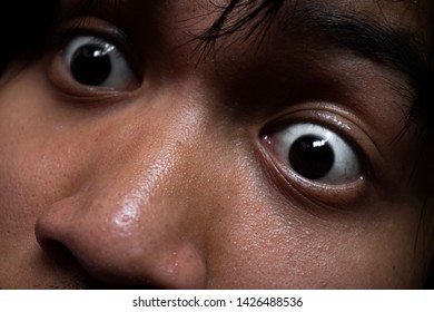 Close Up Shot Of Excited Face Of Man With Eyes Wide Open.
