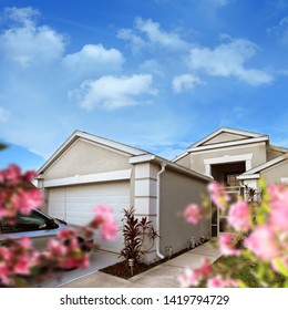 Close Up Shot Of Family Home Exterior Over Sky In Florida