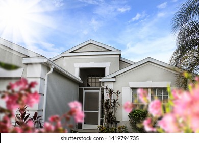 Close Up Shot Of Family Home Exterior Over Sky In Florida