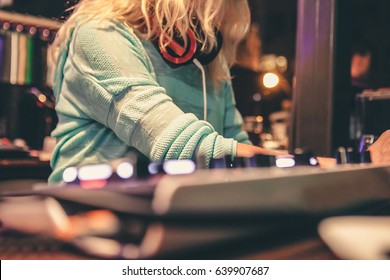 A Close Up Shot Of A Female Music Deejay Playing A Set
