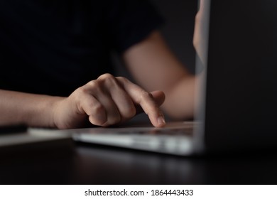 Close up shot of hands typing message on keyboard laptop.