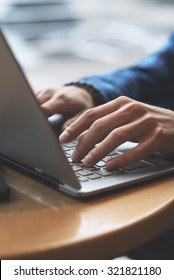 Close Up Shot Of Hands Typing On Laptop 