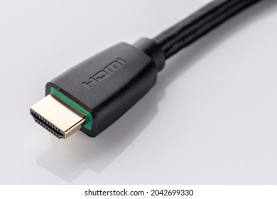 close up shot of High Definition Multimedia Interface, HDMI male connector cable with braid on white background