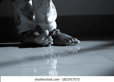 Close Shot Of Indian Baby Girl Bare Feet Isolated On Floor In House