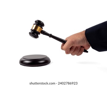 Close up shot of a judge's hand holding a gavel to make a decision isolated on a white background. Auction hammer with wooden stand. The concept of law and justice. - Powered by Shutterstock